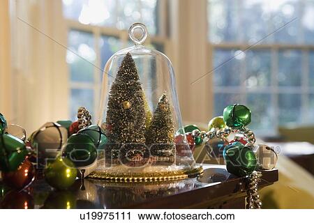 Stock Image - Christmas decorations on table. Fotosearch