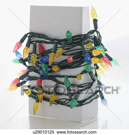 Christmas lights wrapped around box View Large Photo Image Stock Photography - Christmas lights wrapped around box. Fotosearch