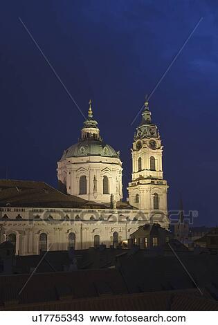 Stock Image - Church illuminated at night. Fotosearch