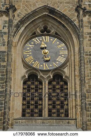 Stock Photograph - Clock of Saint Vitus Cathedral in Prague. Fotosearch
