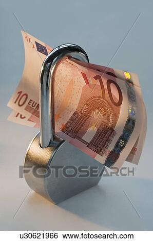 Close up lock and paper euros View Large Photo Image Stock Photograph - Close up lock and paper euros. Fotosearch