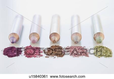Stock Image - Close up of assorted makeup pencils. Fotosearch