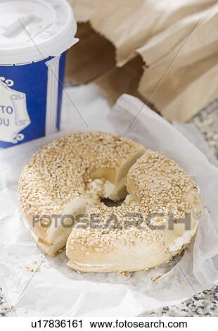 Close up of bagel and coffee View Large Photo Image Stock Image - Close up of bagel and coffee. Fotosearch