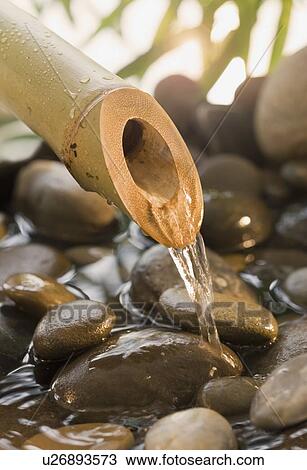 Stock Image - Close up of bamboo fountain. Fotosearch