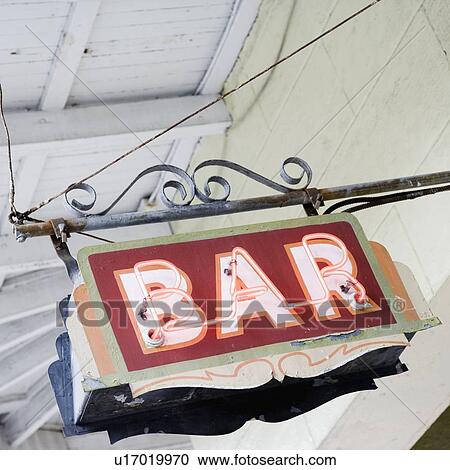 Stock Image - Close up of bar sign, French Quarter, New Orleans, Louisiana, United States. Fotosearch