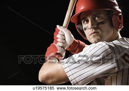 Stock Photography - Close up of baseball player in batting stance. Fotosearch