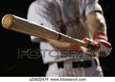 Close up of baseball player swinging bat View Large Photo Image Picture - Close up of baseball player swinging bat. Fotosearch