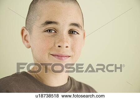 Stock Photo - Close up of boy smiling. Fotosearch