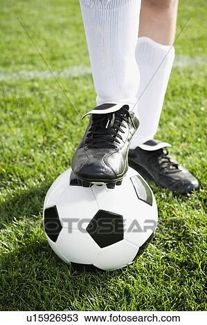 Close up of boy’s foot on soccer ball View Large Photo Image Stock Image - Close up of boy’s foot on soccer ball. Fotosearch