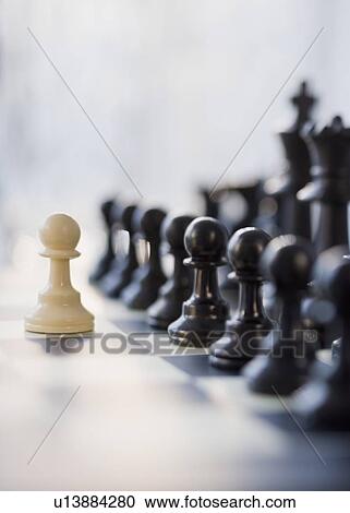 Stock Image - Close up of chess pieces. Fotosearch