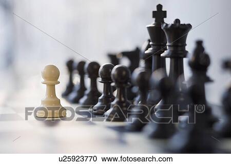Stock Image - Close up of chess pieces. Fotosearch