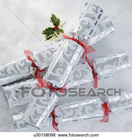 Close up of Christmas gifts in snow View Large Photo Image Stock Photo - Close up of Christmas gifts in snow. Fotosearch
