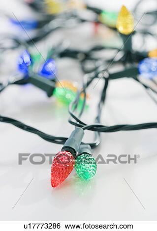 Stock Photograph - Close up of Christmas lights. Fotosearch