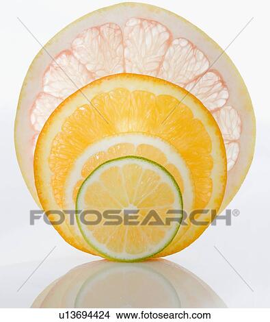 Close up of citrus fruit slices View Large Photo Image Picture - Close up of citrus fruit slices. Fotosearch