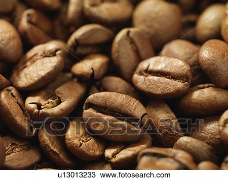 Stock Image - Close up of coffee beans. Fotosearch