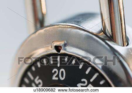Stock Image - Close up of combination lock. Fotosearch