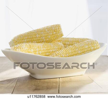 Close up of corn in bowl View Large Photo Image Stock Photo - Close up of corn in bowl. Fotosearch