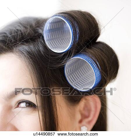 Close up of curlers in woman’s hair View Large Photo Image Stock Photo - Close up of curlers in woman’s hair. Fotosearch