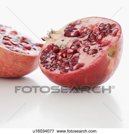 Stock Photo - Close up of cut pomegranate. Fotosearch