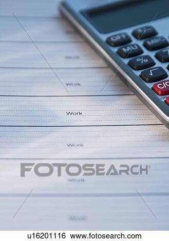 Close up of datebook and calculator View Large Photo Image Stock Photograph - Close up of datebook and calculator. Fotosearch