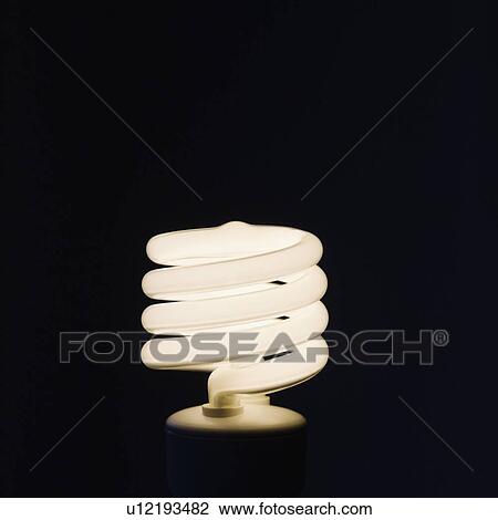 Close up of energy efficient light bulb View Large Photo Image Stock Image - Close up of energy efficient light bulb. Fotosearch