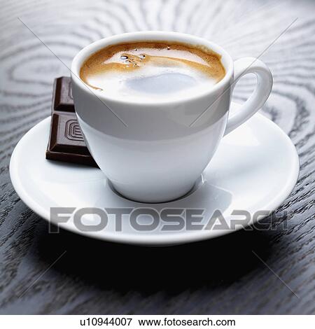 Close up of espresso and chocolate View Large Photo Image Stock Photo - Close up of espresso and chocolate. Fotosearch