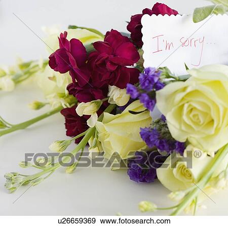 Close up of flower bouquet and note View Large Photo Image Stock Photo - Close up of flower bouquet and note. Fotosearch