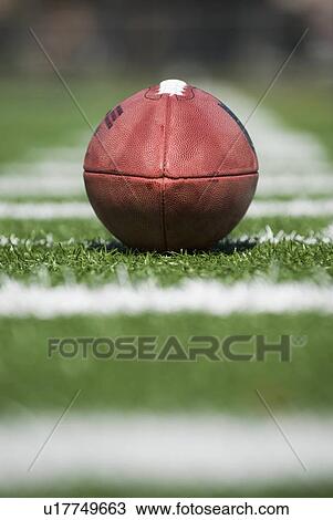 Close up of football on yard line marker View Large Photo Image Stock Image - Close up of football on yard line marker. Fotosearch
