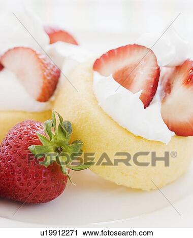 Stock Image - Close up of fresh strawberry shortcake. Fotosearch