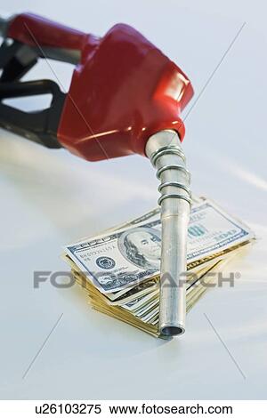 Close up of gas pump and money View Large Photo Image Stock Photography - Close up of gas pump and money. Fotosearch