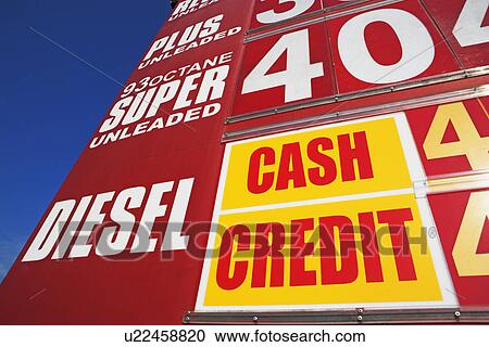 Stock Image - Close up of gas station sign. Fotosearch