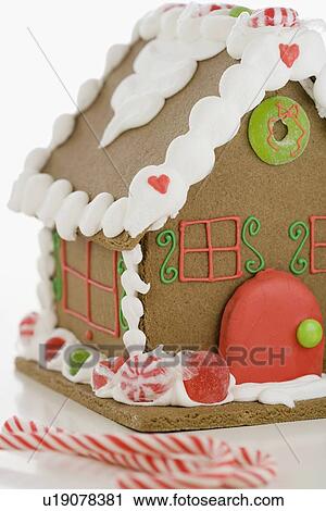 Stock Image - Close up of gingerbread house. Fotosearch