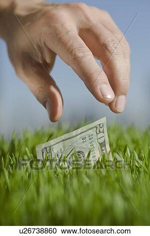 Close up of hand reaching for twenty dollar bill View Large Photo Image Stock Image - Close up of hand reaching for twenty dollar bill. Fotosearch