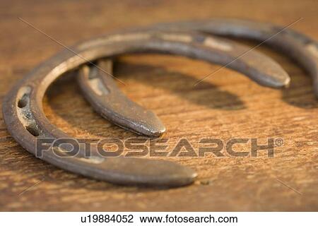 Stock Image - Close up of horseshoes. Fotosearch