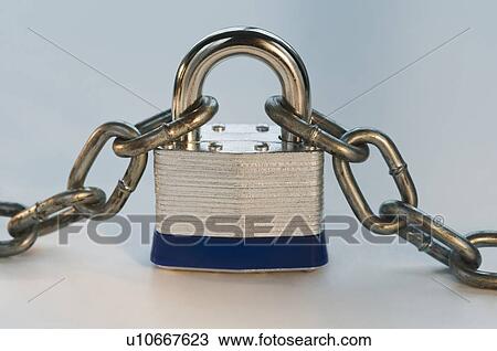Stock Image - Close up of lock and metal chain. Fotosearch