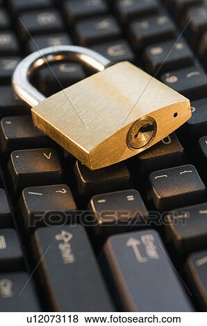 Close up of lock on computer keyboard View Large Photo Image Stock Photo - Close up of lock on computer keyboard. Fotosearch