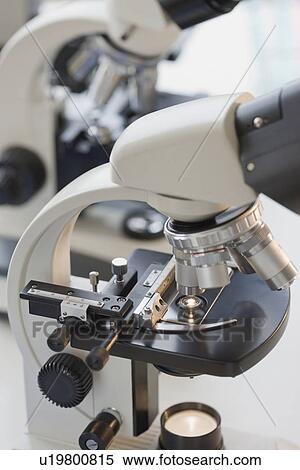 Stock Photography - Close up of microscope. Fotosearch