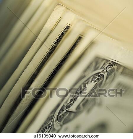 Stock Image - Close up of one dollar bills. Fotosearch