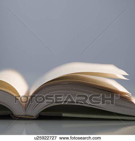 Close up of open book View Large Photo Image Stock Photo - Close up of open book. Fotosearch