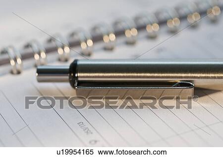 Close up of pen and organizer View Large Photo Image Stock Photography - Close up of pen and organizer. Fotosearch