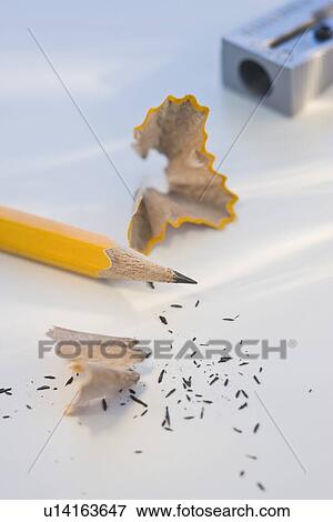 Stock Photo - Close up of pencil and sharpener. Fotosearch