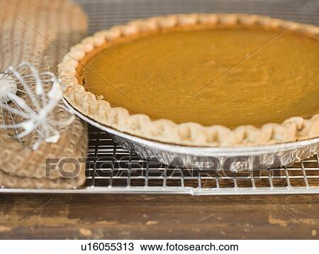 Close up of pie on cooling rack View Large Photo Image Stock Image - Close up of pie on cooling rack. Fotosearch