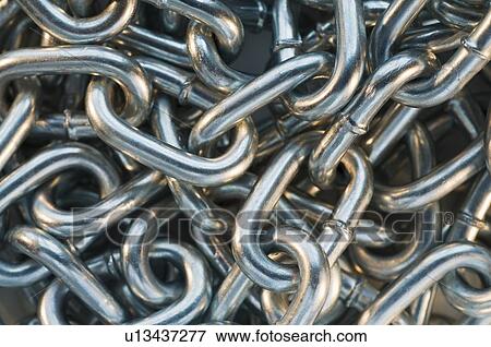 Stock Photo - Close up of pile of metal chain. Fotosearch