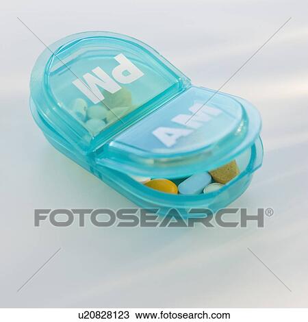 Stock Image - Close up of pill box. Fotosearch