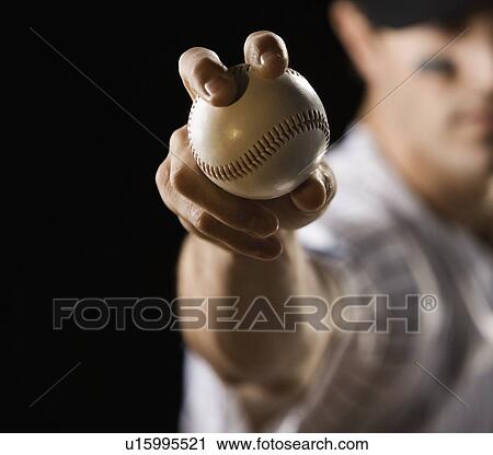 Close up of pitcher holding baseball View Large Photo Image Stock Image - Close up of pitcher holding baseball. Fotosearch