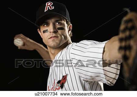 Picture - Close up of pitcher throwing baseball. Fotosearch