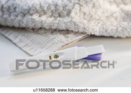 Stock Photo - Close up of pregnancy test. Fotosearch