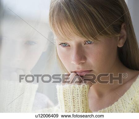 Close up of sad girl View Large Photo Image Stock Photo - Close up of sad girl. Fotosearch