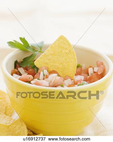 Close up of salsa and tortilla chips View Large Photo Image Stock Photo - Close up of salsa and tortilla chips. Fotosearch