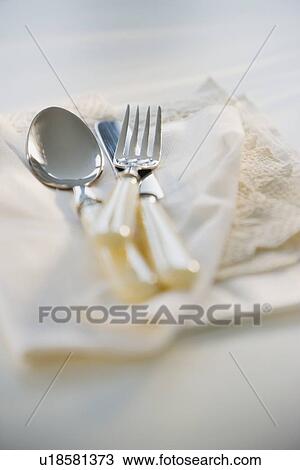 Close up of silverware on napkin View Large Photo Image Stock Image - Close up of silverware on napkin. Fotosearch